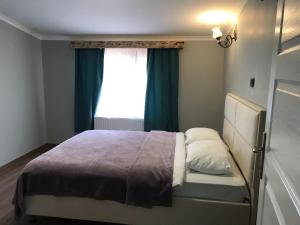 صورة لـ فندق ومطعم ييديجولر في أوزونغول