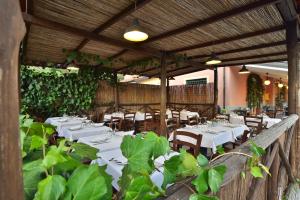 A restaurant or other place to eat at Antica Locanda Luigina