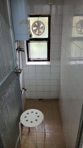 Ένα μπάνιο στο YHA Ngong Ping SG Davis Youth Hostel