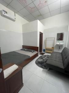 Posezení v ubytování Nhà Nghỉ Mỹ Linh 5