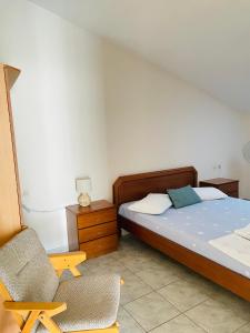 Postel nebo postele na pokoji v ubytování Aktaion Hotel