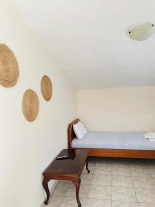 Postel nebo postele na pokoji v ubytování Aktaion Hotel