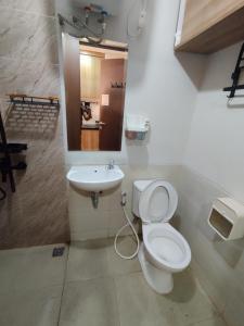 Koupelna v ubytování Sleep Room transpark Cibubur