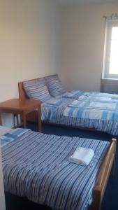 Postel nebo postele na pokoji v ubytování Hotel Britz