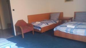 Postel nebo postele na pokoji v ubytování Hotel Britz