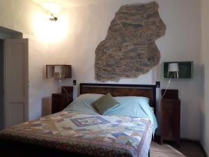 Postel nebo postele na pokoji v ubytování Limone e Peperoncino B&B
