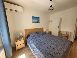 Postel nebo postele na pokoji v ubytování T2 Bleu Mer - Centre ville, plage et gare