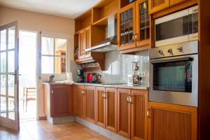 Kuchnia lub aneks kuchenny w obiekcie Villa Salgueiros