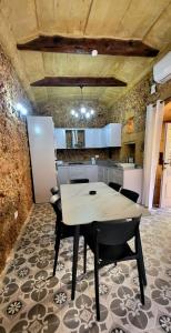 Kuchyň nebo kuchyňský kout v ubytování Tan-Napli Farmhouse + 18 fotografií