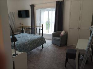 Posteľ alebo postele v izbe v ubytovaní Garryhack House