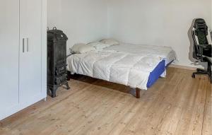 Ένα ή περισσότερα κρεβάτια σε δωμάτιο στο 3 Bedroom Gorgeous Home In Bergkvara