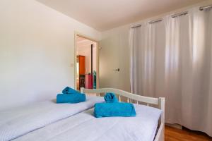 Posteľ alebo postele v izbe v ubytovaní Domaine de la Garenne Ronel