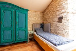 Posteľ alebo postele v izbe v ubytovaní Domaine de la Garenne Ronel