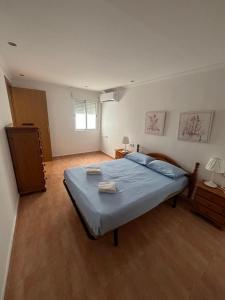 Postel nebo postele na pokoji v ubytování Apartamento Cullera Playa San Antonio