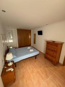 Postel nebo postele na pokoji v ubytování Apartamento Cullera Playa San Antonio