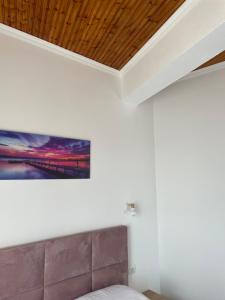 Postel nebo postele na pokoji v ubytování Enma Rooms