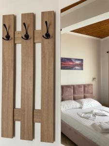 Postel nebo postele na pokoji v ubytování Enma Rooms