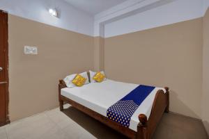 Foto Bangalore’is asuva majutusasutuse SPOT ON Canton Lodging And Boarding galeriist