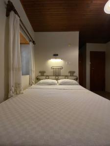 Кровать или кровати в номере Medusa House Butik Hotel