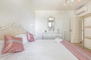 Postel nebo postele na pokoji v ubytování Borgo Dulcedo by Perle di Puglia