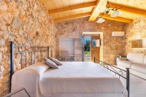 Postel nebo postele na pokoji v ubytování Borgo Dulcedo by Perle di Puglia