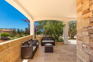 Posezení v ubytování Borgo Dulcedo by Perle di Puglia