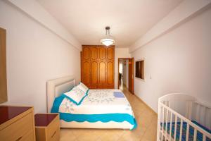 Postel nebo postele na pokoji v ubytování Apartments Cikuli