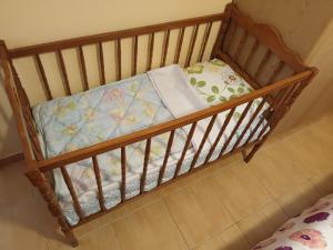 En eller flere senge i et værelse på Holiday Home Barbie