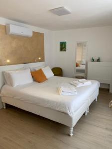 Postel nebo postele na pokoji v ubytování B&B San Francesco Class