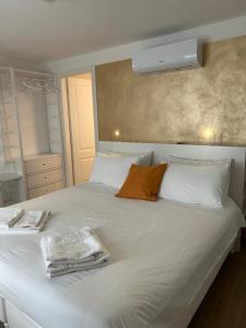 Postel nebo postele na pokoji v ubytování B&B San Francesco Class