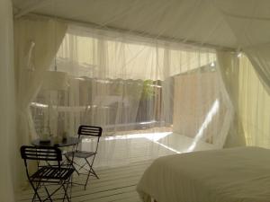 Postel nebo postele na pokoji v ubytování Glamping at Séraphin's