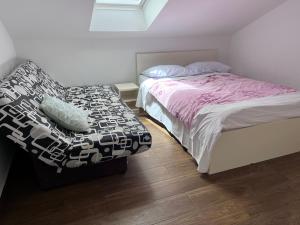Postel nebo postele na pokoji v ubytování Rooms & Apartment Mama Mia