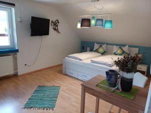 Postel nebo postele na pokoji v ubytování Haus Miele