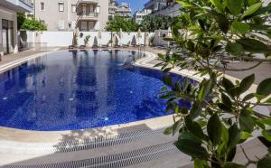 Бассейн в Asli Hotel или поблизости