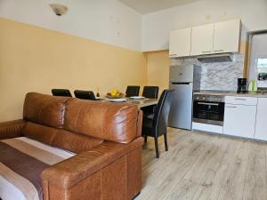 Kuchyňa alebo kuchynka v ubytovaní Apartment Mylo