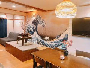 Et tv og/eller underholdning på The garden inn Osaka Dome