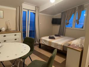 Μια τηλεόραση ή/και κέντρο ψυχαγωγίας στο Guest house Adria