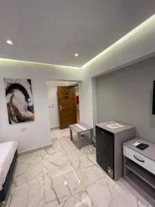 Voodi või voodid majutusasutuse El Mesaadya Hotel فندق المساعدية toas
