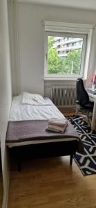 Postel nebo postele na pokoji v ubytování HomeStay with Bo