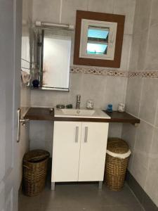Koupelna v ubytování Appartement Villèle + 17 fotografií