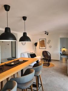 a dining room with a table and chairs at ZARA APARTMENT in Banjole