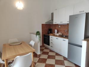 Kuchyň nebo kuchyňský kout v ubytování Rubi 4 + 14 fotografií