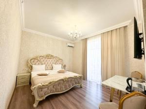 Voodi või voodid majutusasutuse Armenia Hotel toas