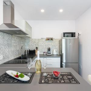Kuchyňa alebo kuchynka v ubytovaní Apartment Mirella