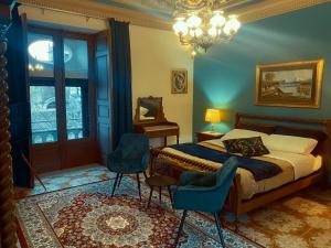 Postel nebo postele na pokoji v ubytování Allure Palace