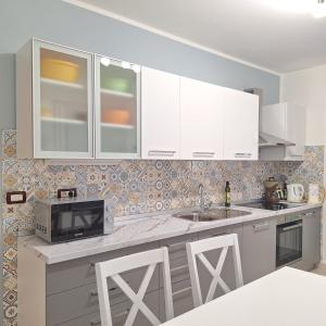 Kuchyňa alebo kuchynka v ubytovaní Apartment Mita