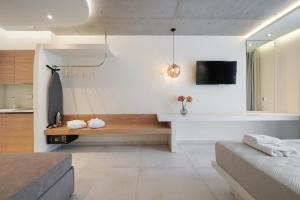 TV a/nebo společenská místnost v ubytování Moderi Luxury Suites