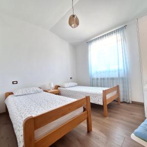 Posteľ alebo postele v izbe v ubytovaní Apartment Mita