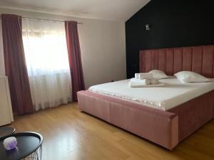 Postel nebo postele na pokoji v ubytování Vila Anir