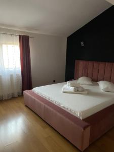 Postel nebo postele na pokoji v ubytování Vila Anir